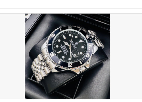 ⌚ RELOJ ESTILO SUBMARINER TRENZADO PLATEADO/NEGRO – ELEGANCIA Y CARÁCTER ⌚