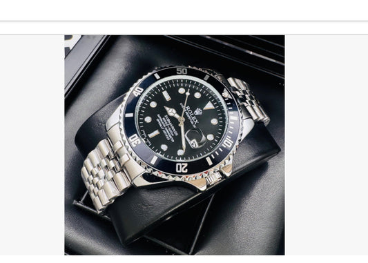 ⌚ RELOJ ESTILO SUBMARINER TRENZADO PLATEADO/NEGRO – ELEGANCIA Y CARÁCTER ⌚